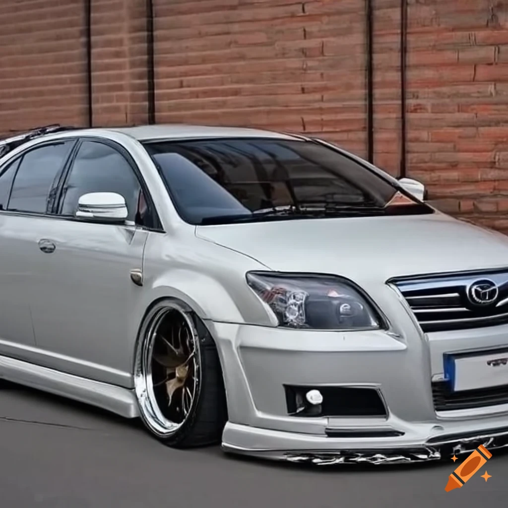 Wide body silver toyota avensis t25 , gold rims, black roof, black