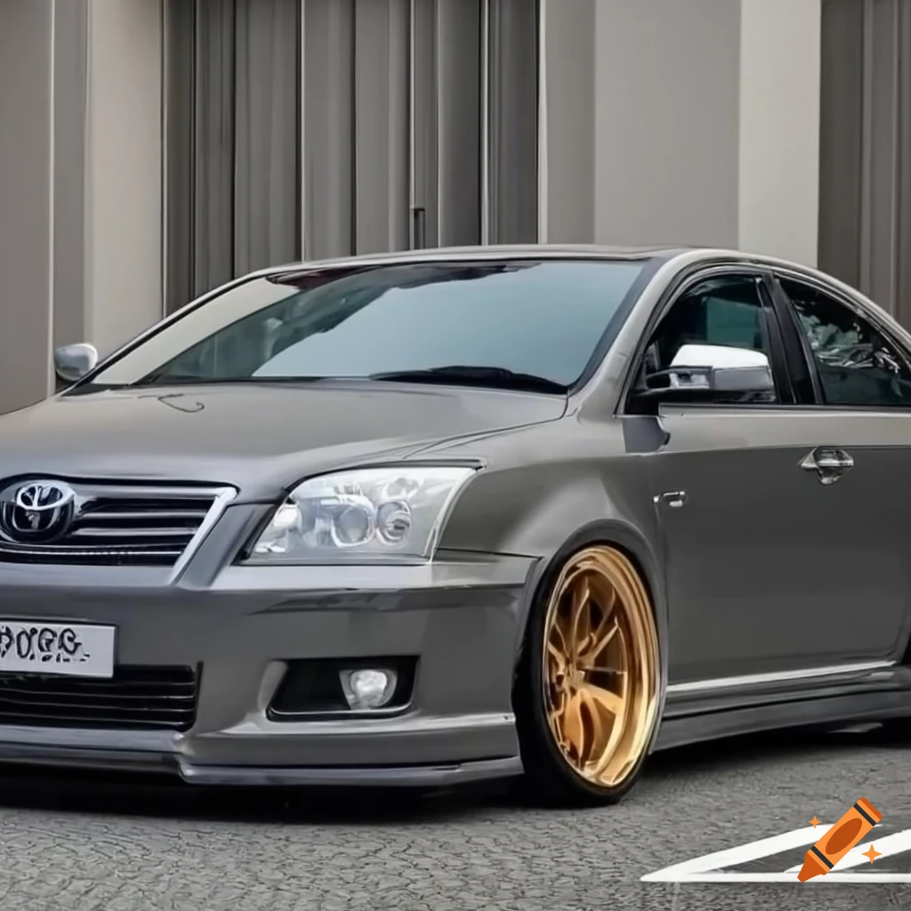 Wide body silver toyota avensis t25 , gold rims, black roof, black