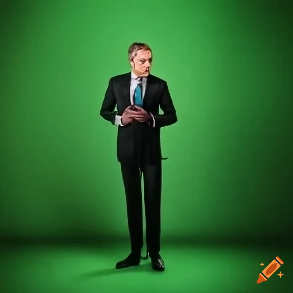 TV moderator standing in front of a green screen