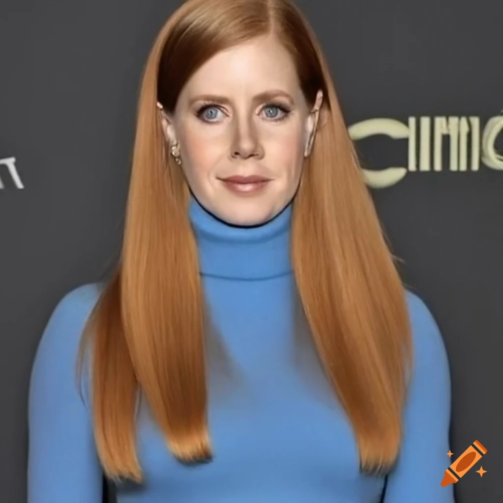 Amy Adams in blue sweater against golden background