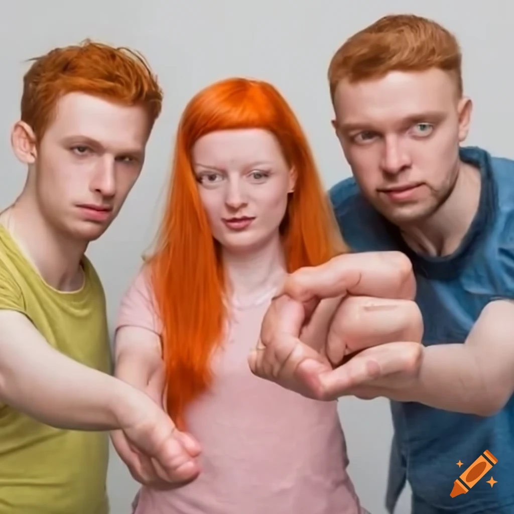 group photo with a red-haired woman looking at tiny hands