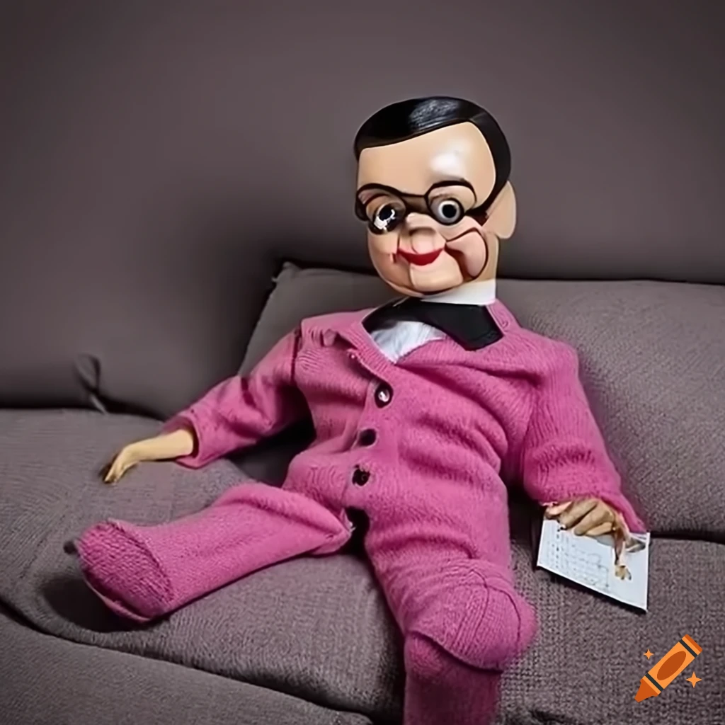 Satirical image of a ventriloquist dummy in a pink suit with credit