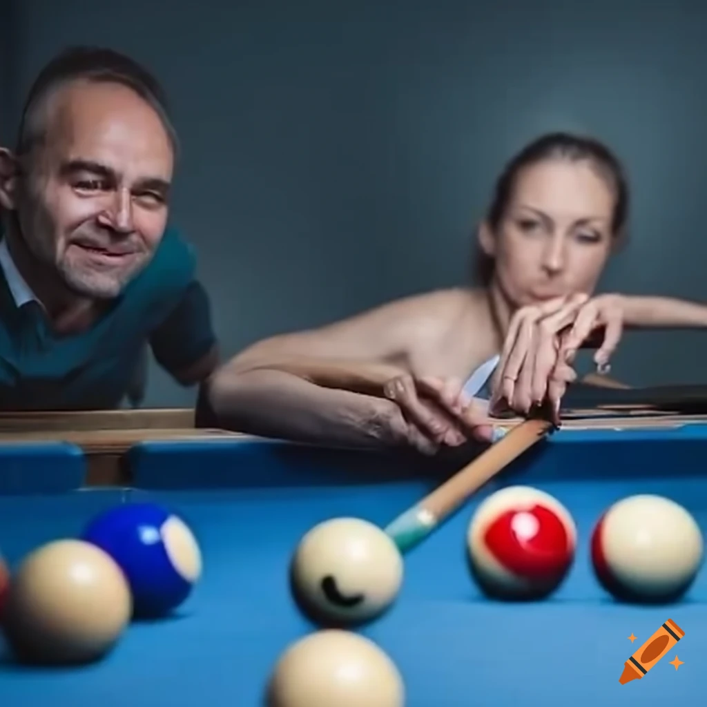 billiard table with 9 pool balls and a man and woman playing