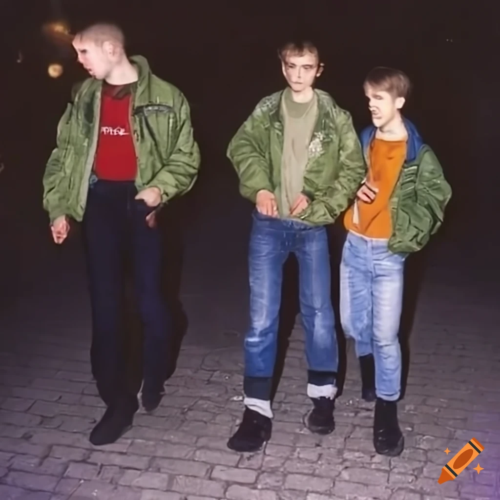 group of teenagers walking on an empty sidewalk in the evening