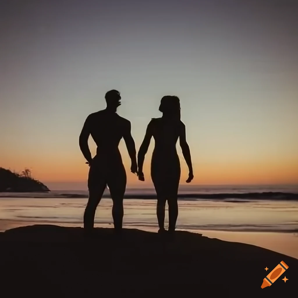 silhouette of a couple watching sunset at the beach
