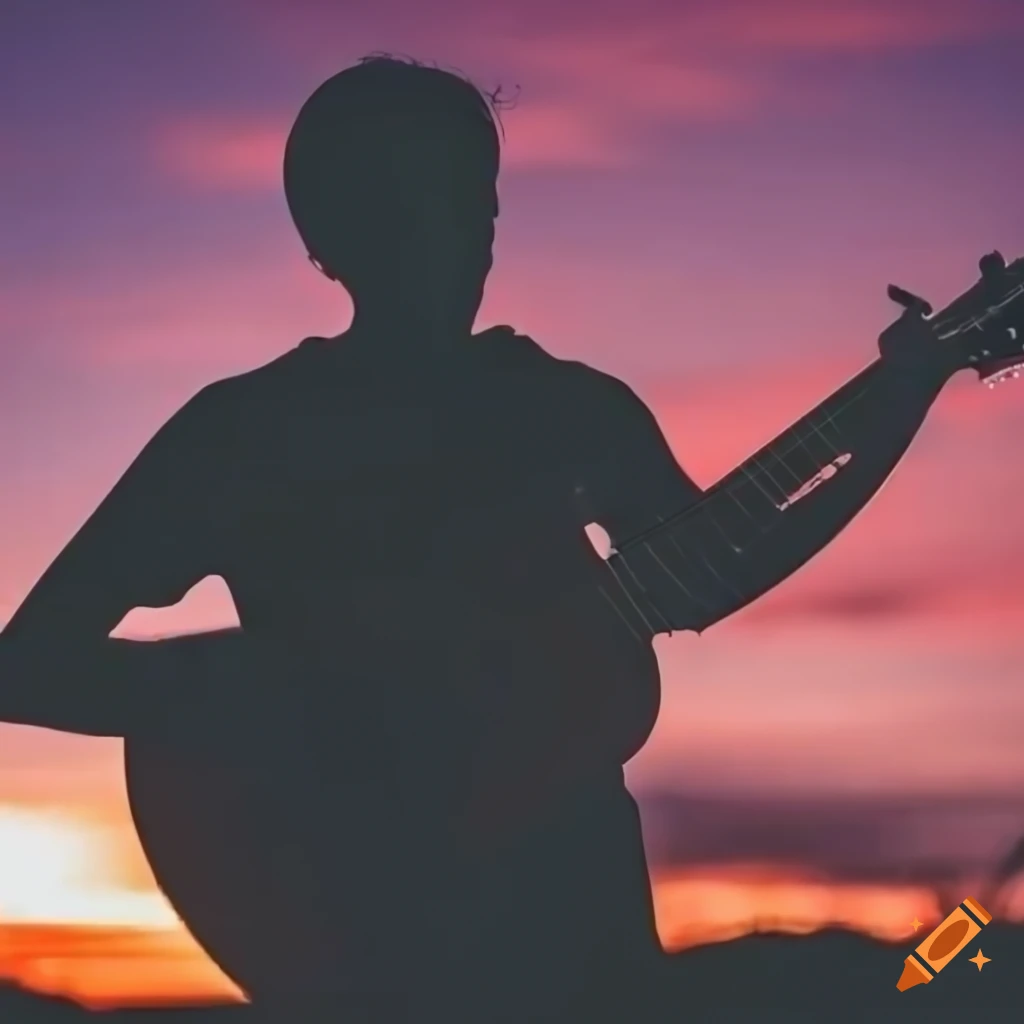 silhouette of a person playing guitar at sunset