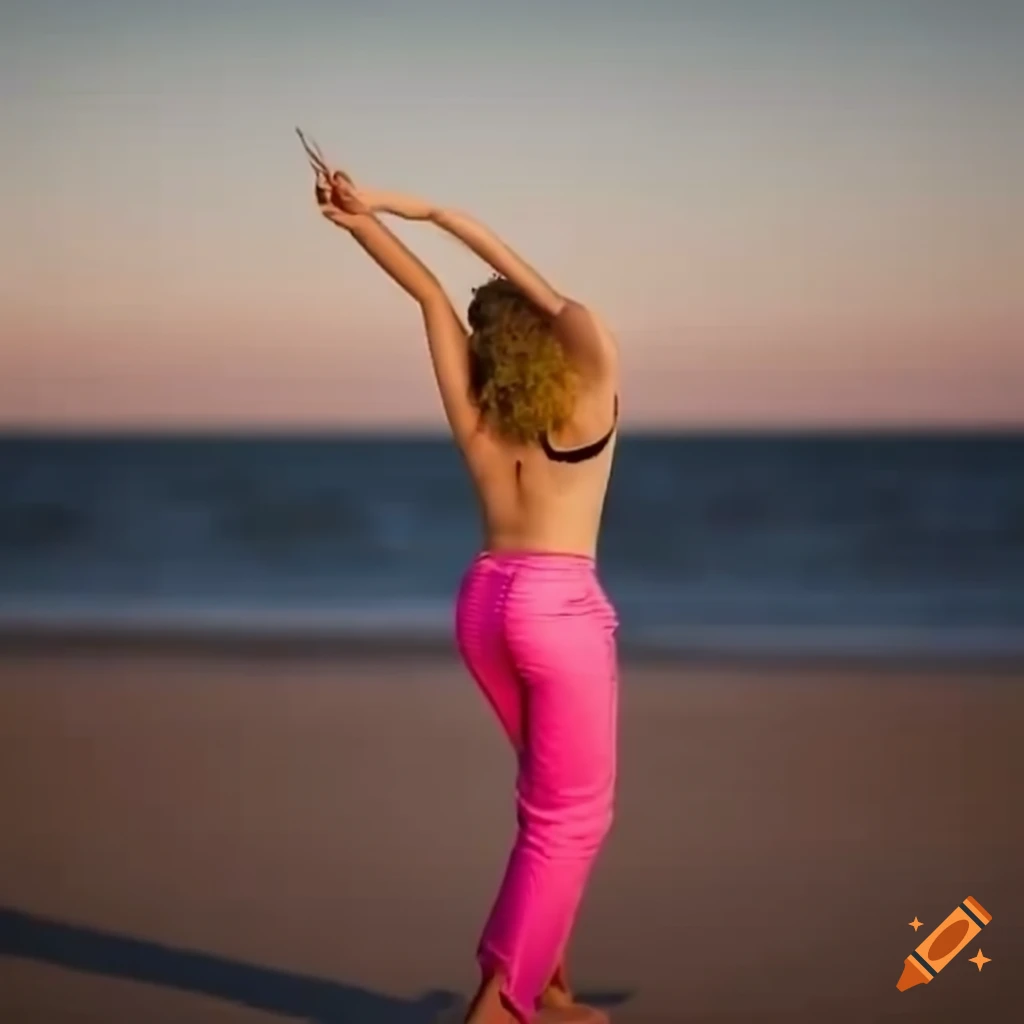 Woman doing yoga on the beach at sunset on Craiyon