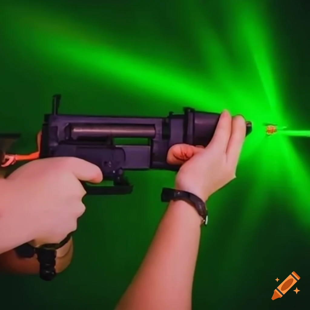 Person firing a green laser beam with a laser gun