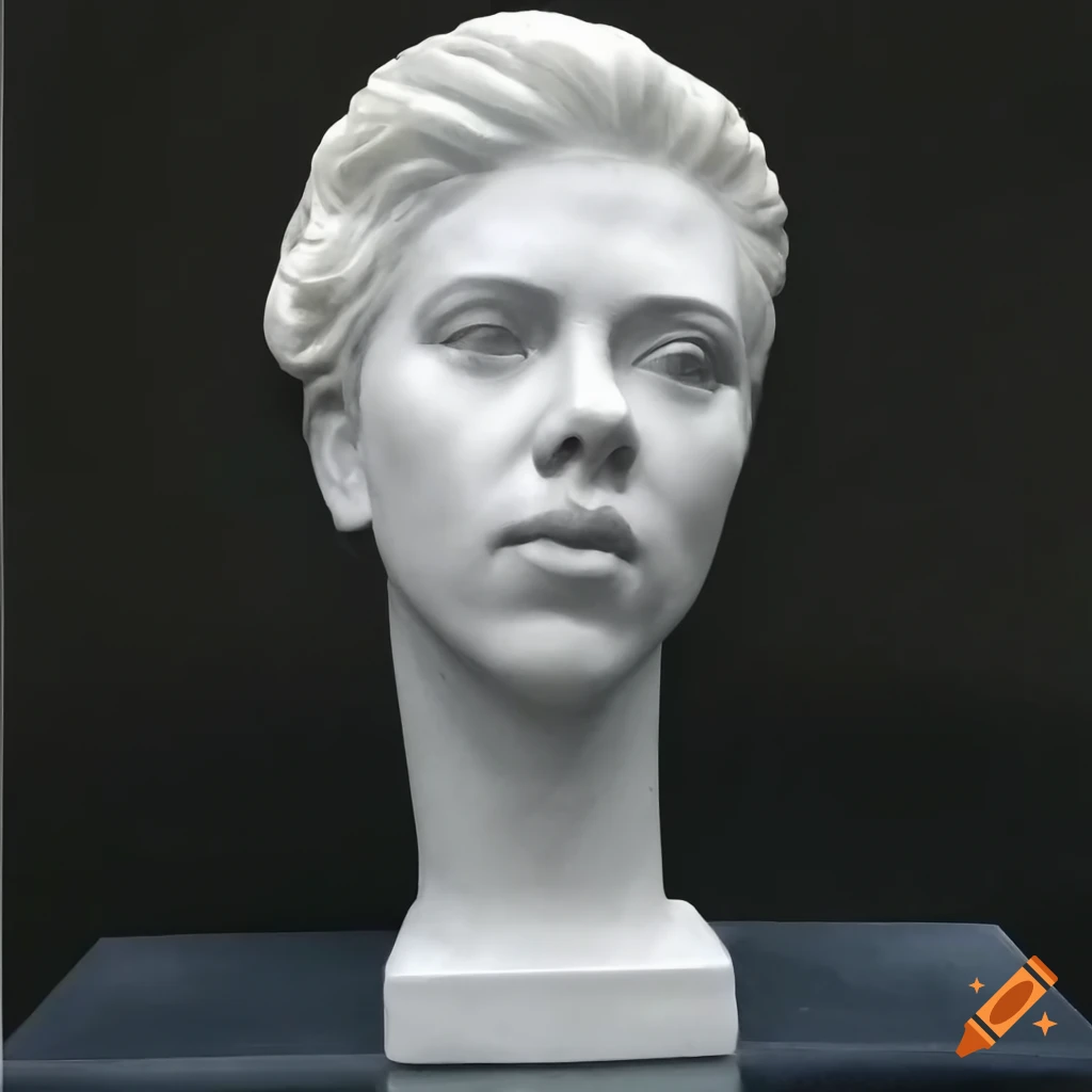 Roughly carved white marble sculpture of scarlett johansson's face and