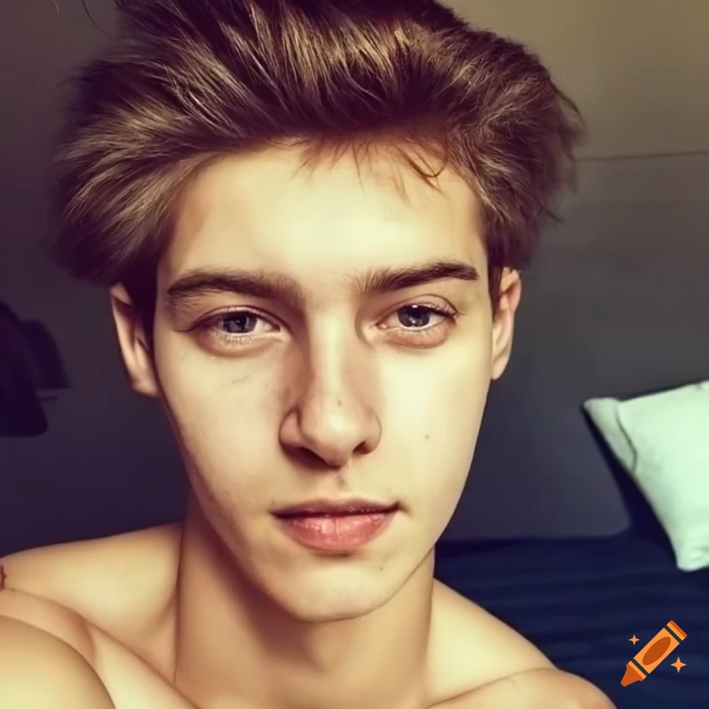 Young man with brown hair taking a selfie in the mirror