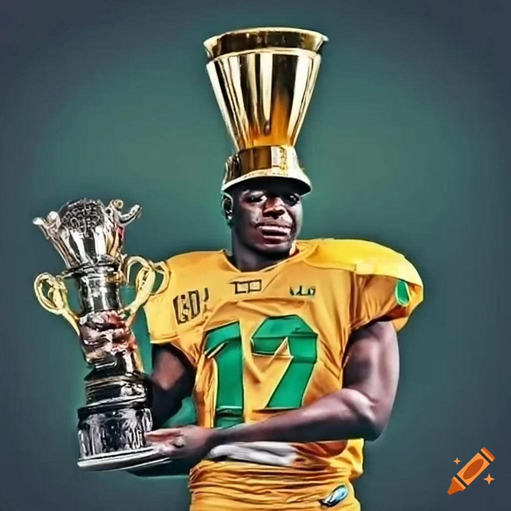 African American quarterback lifting championship trophy and MVP trophy for Nashville Tempo team