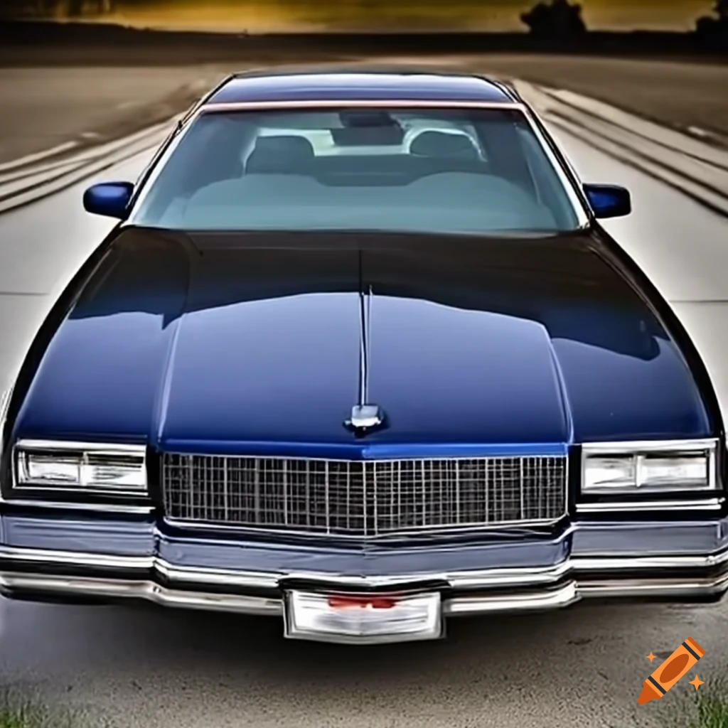 Custom muscle car collection featuring a 1995 Impala SS coupe and a 1982 Chevy Caprice Classic Coupe in midnight blue color