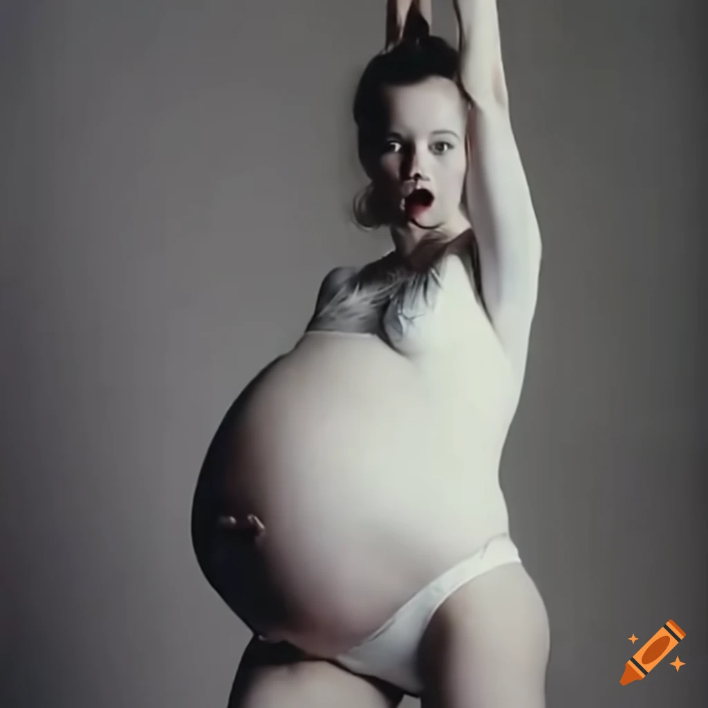 Australian acrobatic lady in white leotard with a surprise twin pregnancy