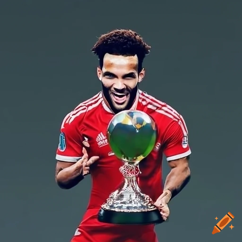 Cedric Soares holding Balon D'or trophy