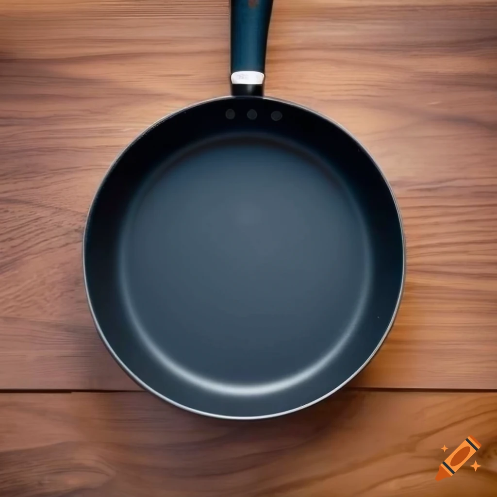Teflon pan with black non-stick base on kitchen worktop