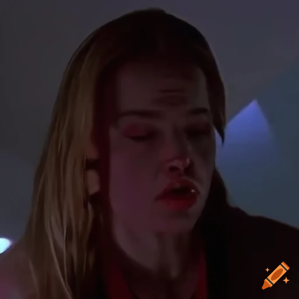 Closeup of 90's movie villainess looking disheveled and bruised