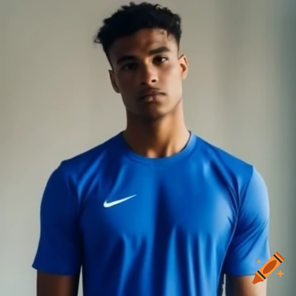 Athletic islander male soccer player wearing blue jersey