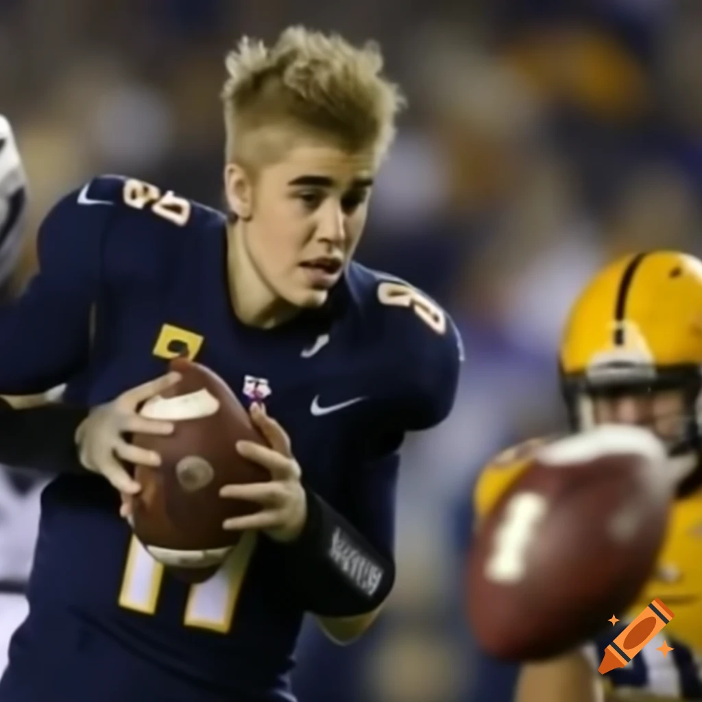 Justin bieber celebrating after spiking a football in the end zone on